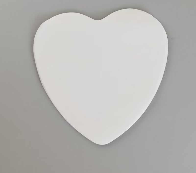 Papier sulfurisé coeur découpé 100 pièces - 15 cm