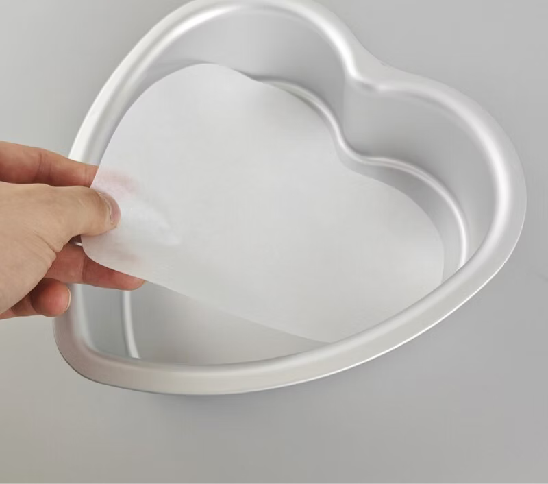 Papier sulfurisé coeur découpé 100 pièces - 20 cm